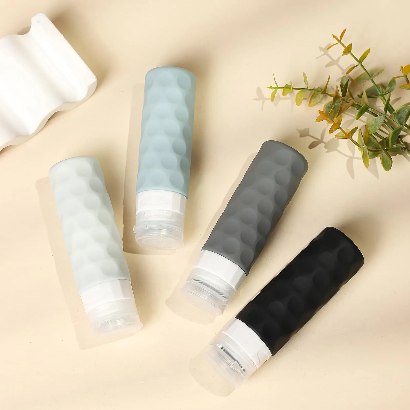 Silevoler Travel Bottles for Toiletries, 4pcs Tsa Approved 3oz Travel Size Containers, BPA Free Leak Proof Premium Silicone Bottles, Refillable Liquid Squeezable Accessories W/Toiletry Bag